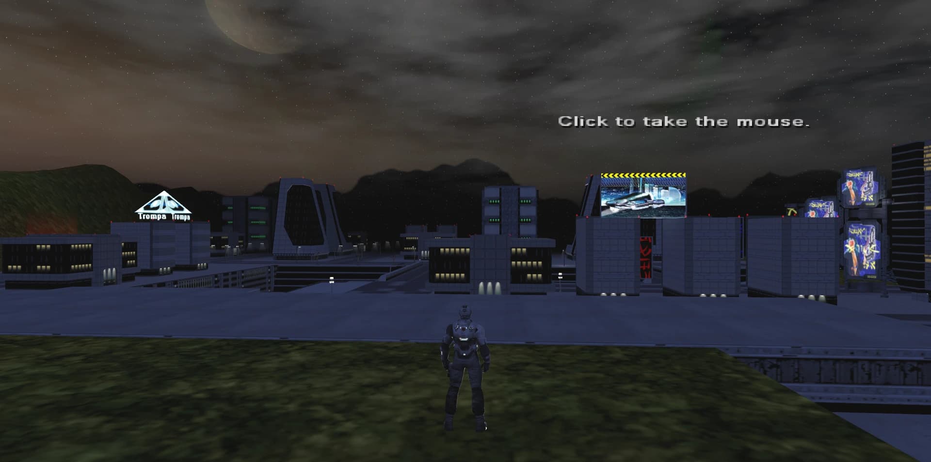 The pilot on foot on a grassy rise at night, looking out over the GoCommando city: lit office blocks, billboards, and mountains under a cloudy sky with a large moon